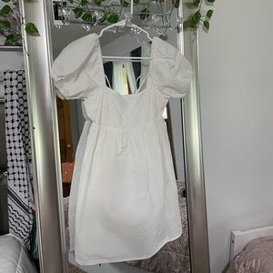 white dress with puffy sleeves